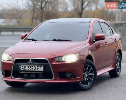 Червоний Міцубісі Lancer, об'ємом двигуна 2.36 л та пробігом 175 тис. км за 7999 $, фото 1 на Automoto.ua