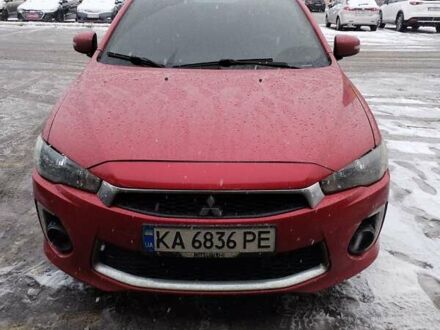 Красный Мицубиси Лансер, объемом двигателя 2 л и пробегом 148 тыс. км за 10200 $, фото 1 на Automoto.ua