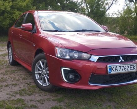 Червоний Міцубісі Lancer, об'ємом двигуна 2 л та пробігом 201 тис. км за 9300 $, фото 1 на Automoto.ua