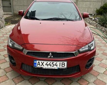 Красный Мицубиси Лансер, объемом двигателя 2 л и пробегом 134 тыс. км за 10500 $, фото 1 на Automoto.ua