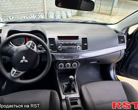 Мицубиси Лансер 2009 в Александрие на Automoto.ua Мицубиси Лансер, объемом двигателя 1.8 л и пробегом 217 тыс. км за 6800 $, фото 5 на Automoto.ua
