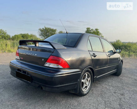 Міцубісі Lancer, об'ємом двигуна 2 л та пробігом 290 тис. км за 4500 $, фото 4 на Automoto.ua