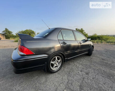 Міцубісі Lancer, об'ємом двигуна 2 л та пробігом 290 тис. км за 4500 $, фото 5 на Automoto.ua