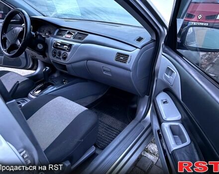 Мицубиси Лансер, объемом двигателя 1.3 л и пробегом 230 тыс. км за 2800 $, фото 11 на Automoto.ua