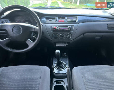 Мицубиси Лансер, объемом двигателя 1.6 л и пробегом 292 тыс. км за 4300 $, фото 11 на Automoto.ua