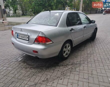 Мицубиси Лансер, объемом двигателя 1.6 л и пробегом 311 тыс. км за 4000 $, фото 3 на Automoto.ua