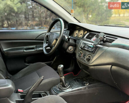 Мицубиси Лансер, объемом двигателя 1.6 л и пробегом 230 тыс. км за 3700 $, фото 6 на Automoto.ua