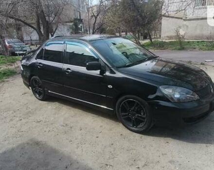 Міцубісі Lancer, об'ємом двигуна 2 л та пробігом 265 тис. км за 4400 $, фото 1 на Automoto.ua