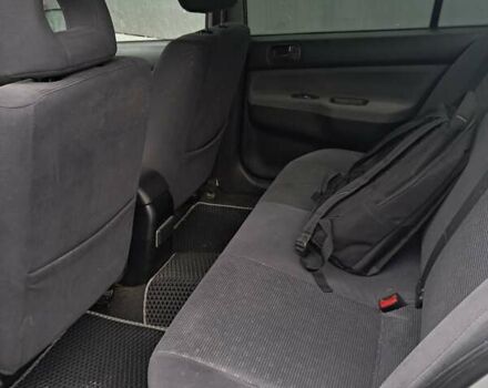 Мицубиси Лансер, объемом двигателя 1.6 л и пробегом 311 тыс. км за 4000 $, фото 4 на Automoto.ua