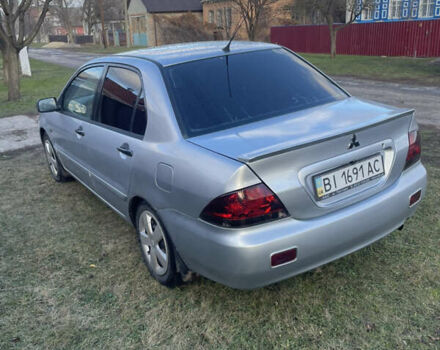 Мицубиси Лансер, объемом двигателя 1.58 л и пробегом 238 тыс. км за 4250 $, фото 6 на Automoto.ua