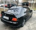 Міцубісі Lancer, об'ємом двигуна 1.58 л та пробігом 195 тис. км за 5200 $, фото 13 на Automoto.ua