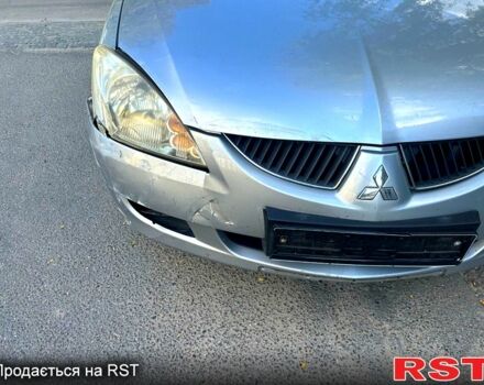 Мицубиси Лансер, объемом двигателя 1.6 л и пробегом 107 тыс. км за 2000 $, фото 2 на Automoto.ua