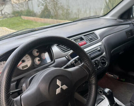 Мицубиси Лансер, объемом двигателя 1.58 л и пробегом 288 тыс. км за 3700 $, фото 6 на Automoto.ua