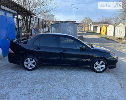 Міцубісі Lancer, об'ємом двигуна 2 л та пробігом 180 тис. км за 5999 $, фото 26 на Automoto.ua