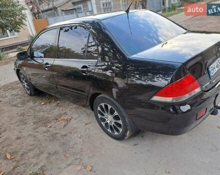 Міцубісі Lancer, об'ємом двигуна 1.6 л та пробігом 170 тис. км за 6000 $, фото 28 на Automoto.ua