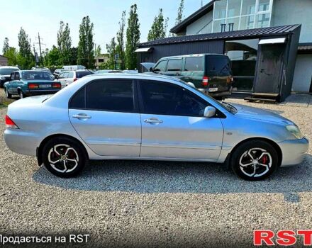 Мицубиси Лансер, объемом двигателя 1.6 л и пробегом 269 тыс. км за 3600 $, фото 1 на Automoto.ua