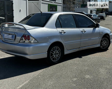 Міцубісі Lancer, об'ємом двигуна 2 л та пробігом 301 тис. км за 4490 $, фото 3 на Automoto.ua