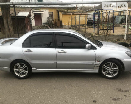 Міцубісі Lancer, об'ємом двигуна 2 л та пробігом 220 тис. км за 5499 $, фото 19 на Automoto.ua