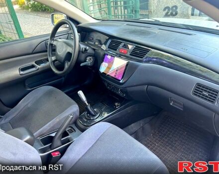 Мицубиси Лансер, объемом двигателя 1.6 л и пробегом 107 тыс. км за 2000 $, фото 3 на Automoto.ua