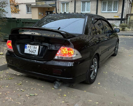 Мицубиси Лансер, объемом двигателя 2 л и пробегом 299 тыс. км за 4950 $, фото 5 на Automoto.ua