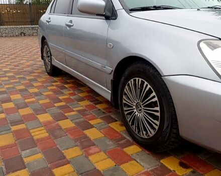 Мицубиси Лансер, объемом двигателя 1.6 л и пробегом 220 тыс. км за 4000 $, фото 1 на Automoto.ua