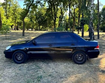 Міцубісі Lancer, об'ємом двигуна 1.6 л та пробігом 248 тис. км за 4600 $, фото 4 на Automoto.ua