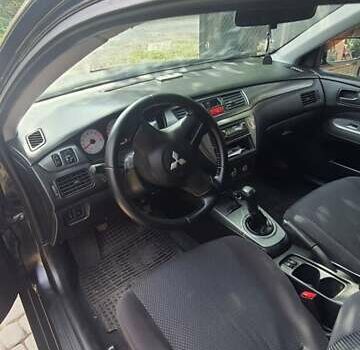 Мицубиси Лансер, объемом двигателя 1.58 л и пробегом 220 тыс. км за 4200 $, фото 10 на Automoto.ua