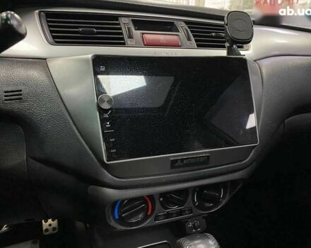 Міцубісі Lancer, об'ємом двигуна 0 л та пробігом 303 тис. км за 5990 $, фото 22 на Automoto.ua