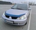 Мицубиси Лансер, объемом двигателя 1.6 л и пробегом 299 тыс. км за 2700 $, фото 1 на Automoto.ua