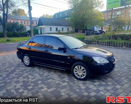 Мицубиси Лансер, объемом двигателя 1.6 л и пробегом 204 тыс. км за 3500 $, фото 3 на Automoto.ua
