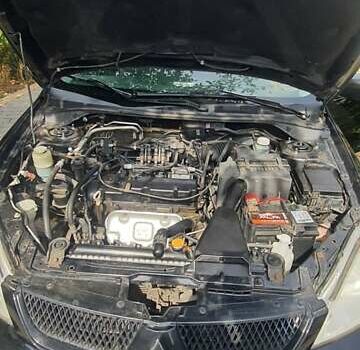 Мицубиси Лансер, объемом двигателя 1.58 л и пробегом 220 тыс. км за 4200 $, фото 9 на Automoto.ua