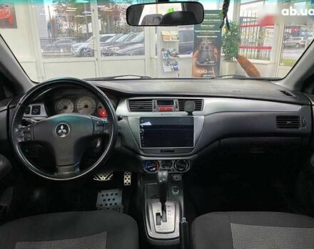 Міцубісі Lancer, об'ємом двигуна 0 л та пробігом 303 тис. км за 5990 $, фото 21 на Automoto.ua