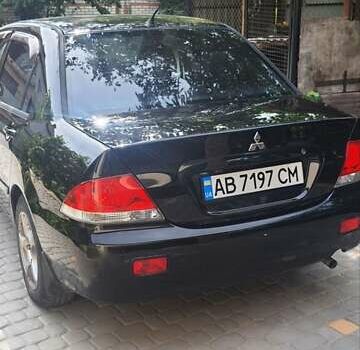 Мицубиси Лансер, объемом двигателя 1.58 л и пробегом 220 тыс. км за 4200 $, фото 5 на Automoto.ua