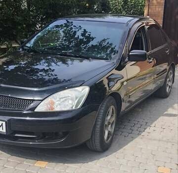 Мицубиси Лансер, объемом двигателя 1.58 л и пробегом 220 тыс. км за 4200 $, фото 2 на Automoto.ua