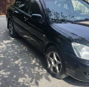 Мицубиси Лансер, объемом двигателя 1.58 л и пробегом 220 тыс. км за 4200 $, фото 3 на Automoto.ua