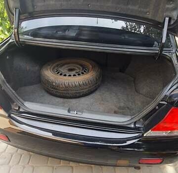 Мицубиси Лансер, объемом двигателя 1.58 л и пробегом 220 тыс. км за 4200 $, фото 12 на Automoto.ua