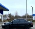 Мицубиси Лансер, объемом двигателя 1.6 л и пробегом 263 тыс. км за 2900 $, фото 2 на Automoto.ua