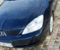 Міцубісі Lancer, об'ємом двигуна 1.6 л та пробігом 209 тис. км за 7000 $, фото 6 на Automoto.ua