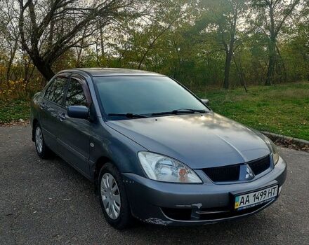 Мицубиси Лансер, объемом двигателя 1.6 л и пробегом 238 тыс. км за 3000 $, фото 5 на Automoto.ua