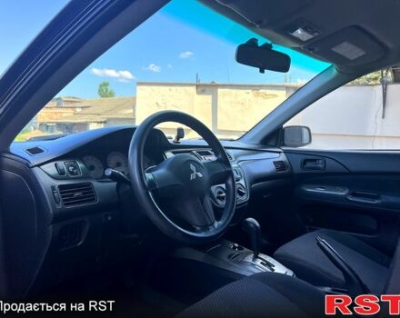 Мицубиси Лансер, объемом двигателя 1.6 л и пробегом 243 тыс. км за 4800 $, фото 4 на Automoto.ua