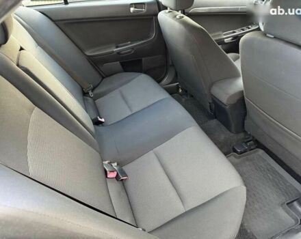 Міцубісі Lancer, об'ємом двигуна 2 л та пробігом 230 тис. км за 6800 $, фото 28 на Automoto.ua