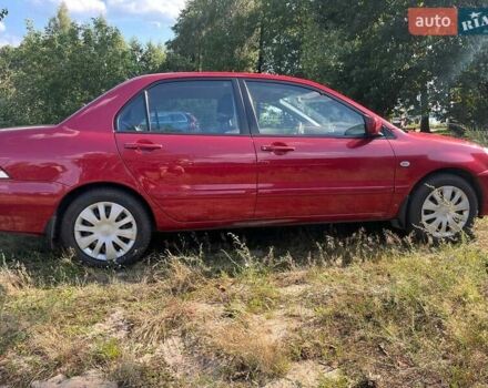 Мицубиси Лансер, объемом двигателя 1.6 л и пробегом 159 тыс. км за 4450 $, фото 2 на Automoto.ua