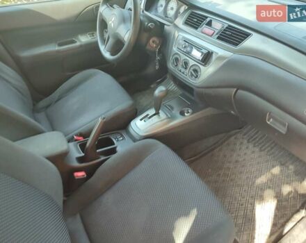 Мицубиси Лансер, объемом двигателя 1.6 л и пробегом 140 тыс. км за 3600 $, фото 4 на Automoto.ua