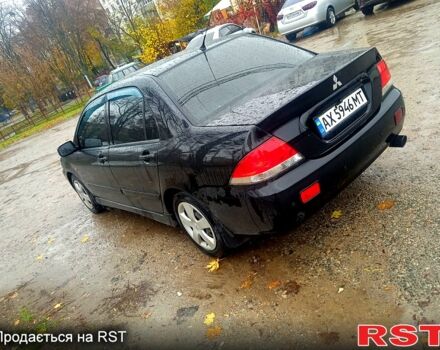 Мицубиси Лансер, объемом двигателя 1.6 л и пробегом 200 тыс. км за 3999 $, фото 2 на Automoto.ua