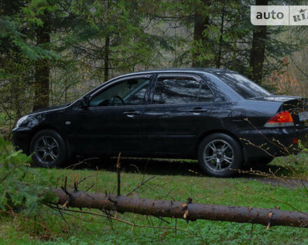 Міцубісі Lancer, об'ємом двигуна 1.58 л та пробігом 219 тис. км за 4500 $, фото 16 на Automoto.ua