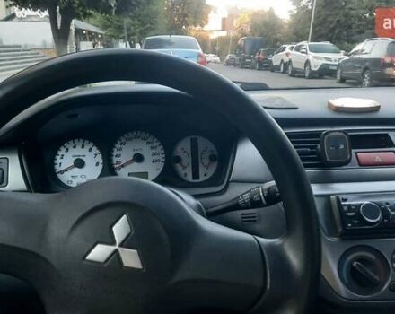 Мицубиси Лансер, объемом двигателя 1.6 л и пробегом 186 тыс. км за 4500 $, фото 5 на Automoto.ua