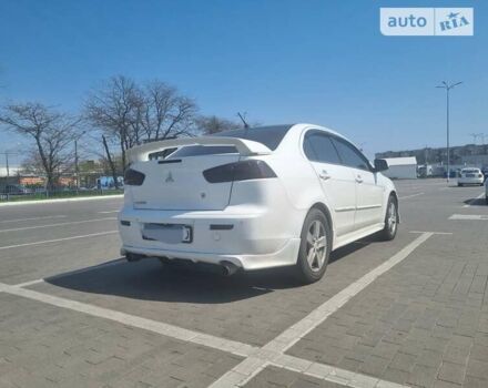 Міцубісі Lancer, об'ємом двигуна 2 л та пробігом 213 тис. км за 7400 $, фото 5 на Automoto.ua