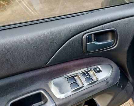 Мицубиси Лансер, объемом двигателя 1.6 л и пробегом 238 тыс. км за 3000 $, фото 11 на Automoto.ua