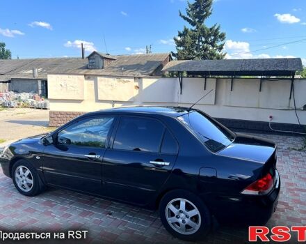 Мицубиси Лансер, объемом двигателя 1.6 л и пробегом 243 тыс. км за 4800 $, фото 1 на Automoto.ua