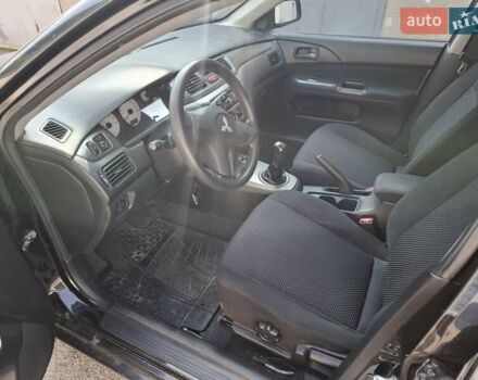 Мицубиси Лансер, объемом двигателя 1.6 л и пробегом 131 тыс. км за 6400 $, фото 5 на Automoto.ua